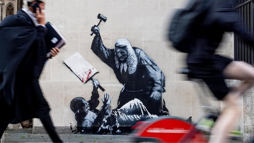 Banksy mural at the Royal Courts of Justice